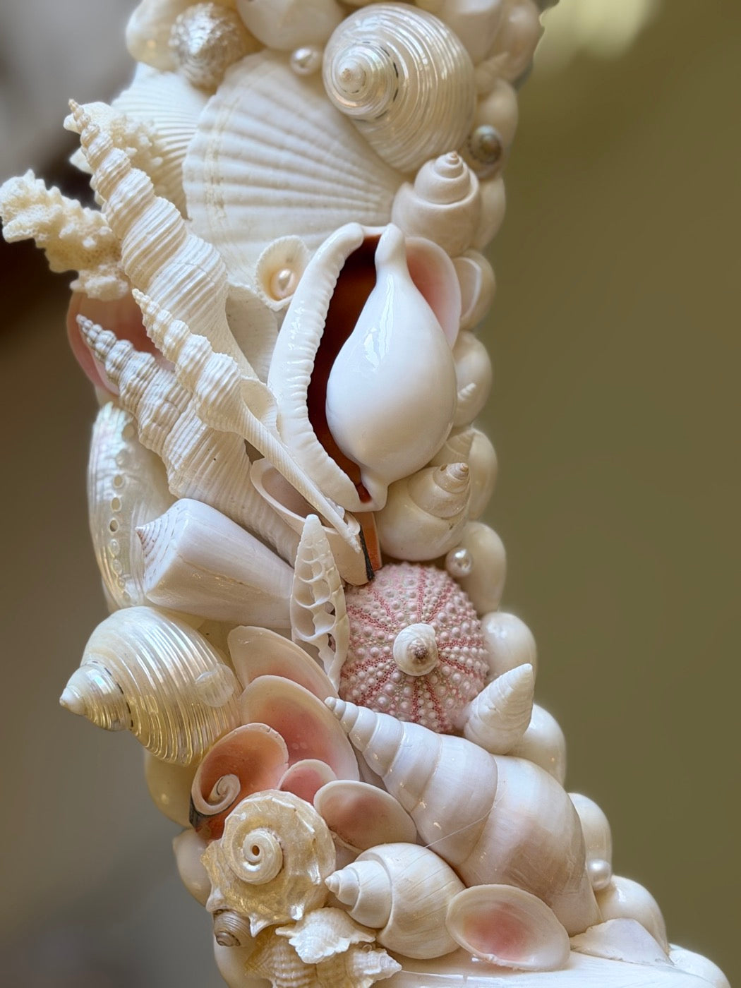 Shells hand-set into a sculptural column